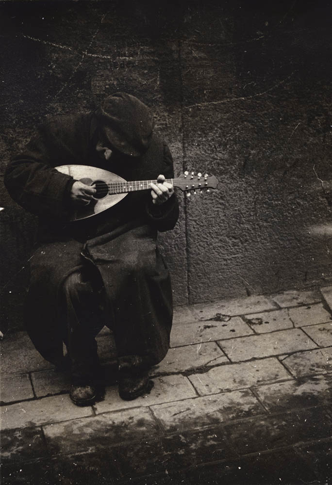 J. Bertolino - Man Playing Mandolin (from "Family of Man")