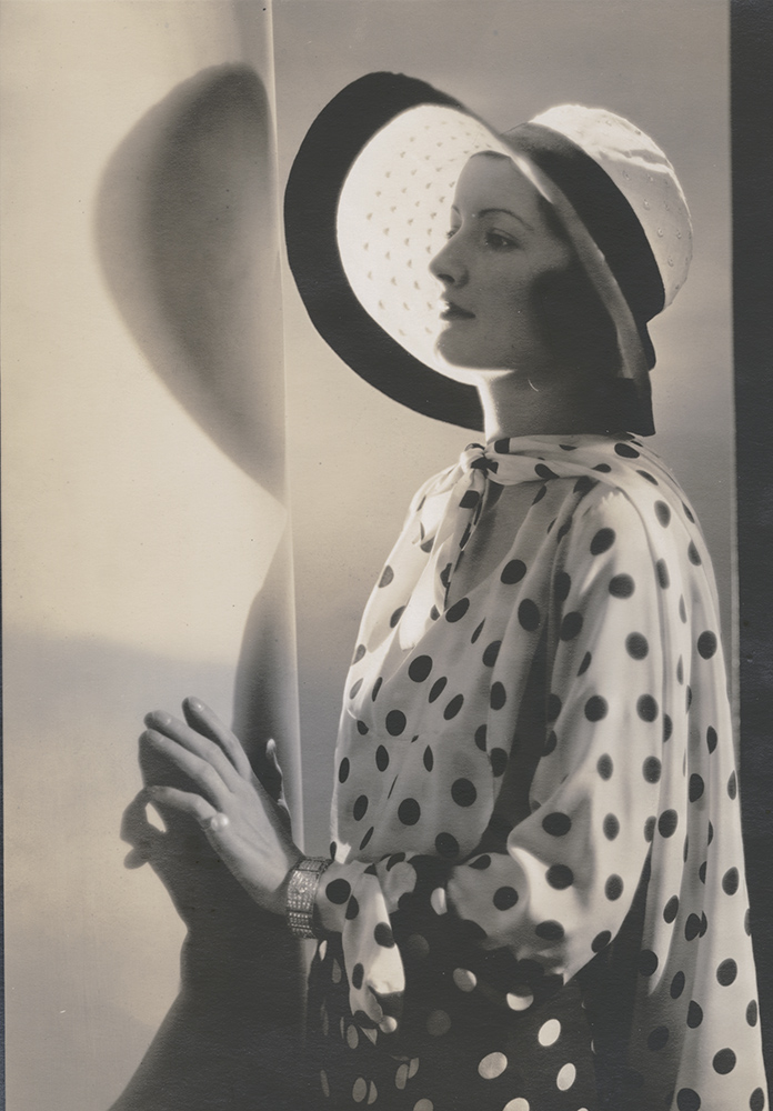 Vogue Magazine Photographer - Woman in Polka Dot Shirt and Hat