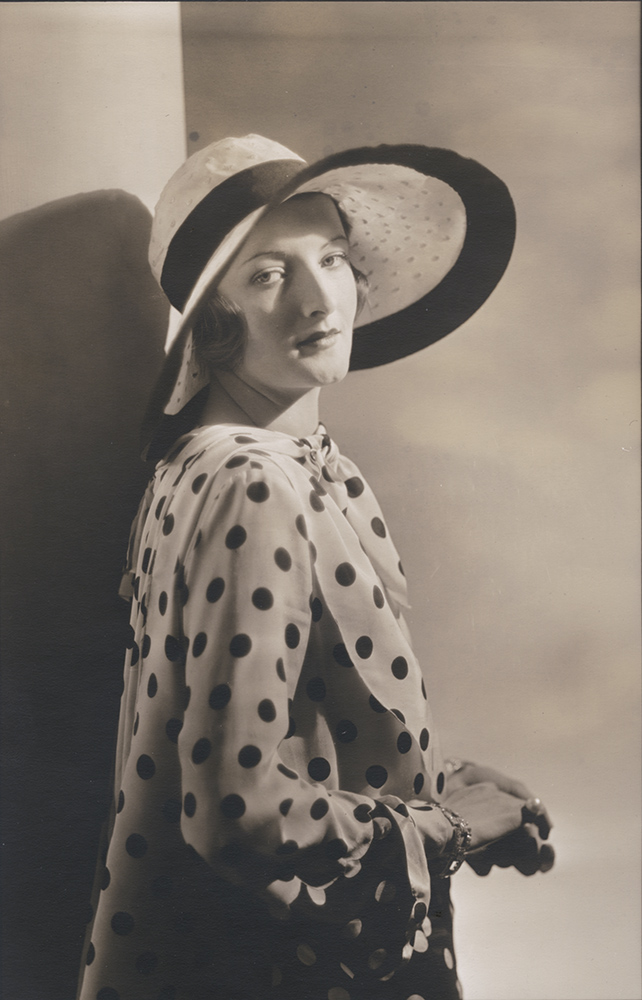 Vogue Magazine Photographer - Woman in Polka Dot Shirt and Hat